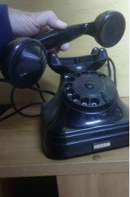 Telefono nero a disco di bachelite d'epoca originale