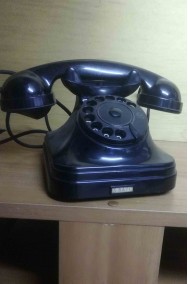 telefono di bachelite nero a disco d'epoca originale