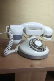 Telefono d'epoca a disco bianco di bachelite