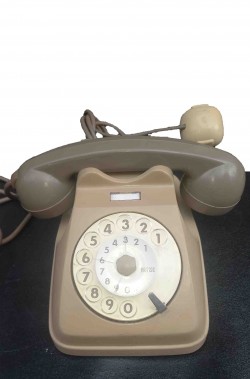 Telefono a disco grigio storico vintage