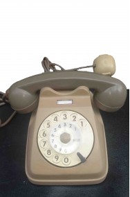 Telefono a disco grigio storico vintage
