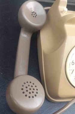 Cornetta del telefono a disco d'epoca vintage in vendita