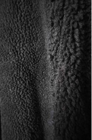 Tessuto del costume da pecora nera