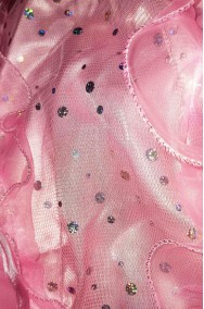 Foto di dettaglio del tessuto del costume da principessa rosa